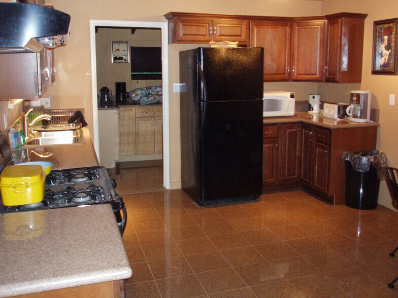 Kitchen and Utility Room - 10809 Huston St