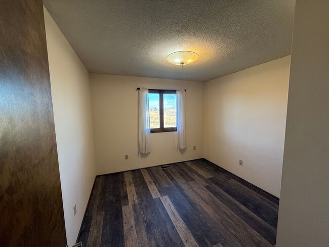 Building Photo - Spacious, four-bedroom, two-bathroom, country home, with two car attached garage, and more!