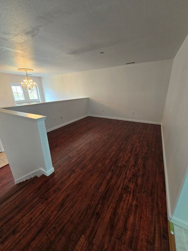 Building Photo - Beautifully Remodeled Tri Story Home located in a Gated Community ...