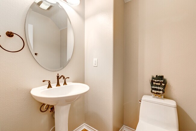 Discreet powder room tucked in its own wing! - 18551 Amalia Ln