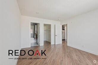 Building Photo - Beautiful and Bright Two Bedroom with Hard...