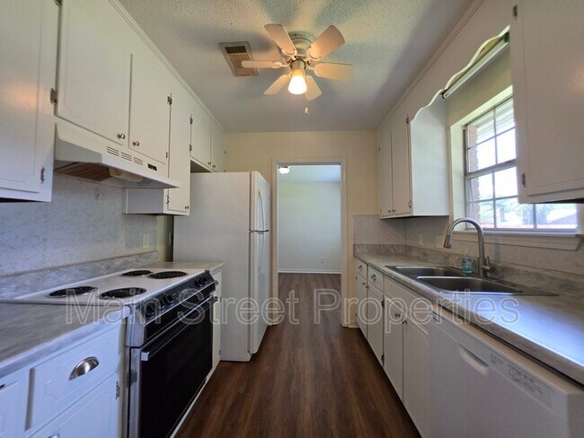 Building Photo - 6942 Falcon Dr