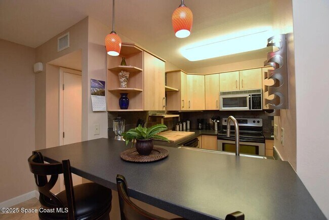 Building Photo - 8401 N Atlantic Ave