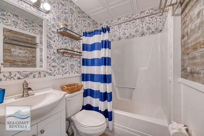 Building Photo - Beach Please @ 218 Sandpiper Dr