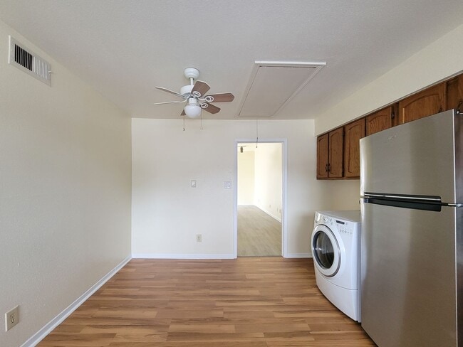 Building Photo - This stunning single-story upstairs unit o...