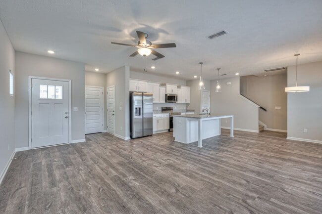Building Photo - Brand New Luxury Townhome! 3 BR, 2.5 BA, 2 Car Garage, Pool, Dog Park, and More!