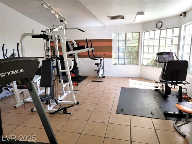Building Photo - Inviting Green Valley Condo with Dual Balc...