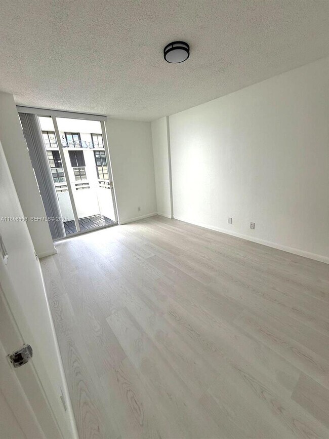 Building Photo - 8911 Collins Ave