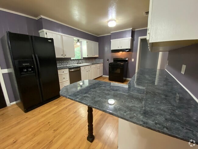 Kitchen with side-by-side fridge & freezer with icemaker and water dispenser & QUIET dishwasher