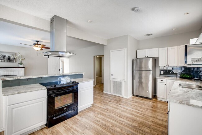 Building Photo - Location, Location, Location! Updated one story home with charm and modern conveniences