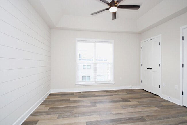 Building Photo - Dog-Friendly Old Trail Townhome - Walk To Local Shops, Restaurants, & More!