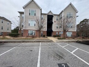 Building Photo - Special Rate! SPACIOUS 1 Bed 1.5 Bath Condo with Sunroom and AMENITIES!!!