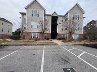 Building Photo - Special Rate! SPACIOUS 1 Bed 1.5 Bath Condo with Sunroom and AMENITIES!!!