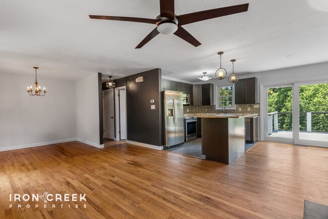 Building Photo - Beautifully Updated Three-Bedroom with Koi...