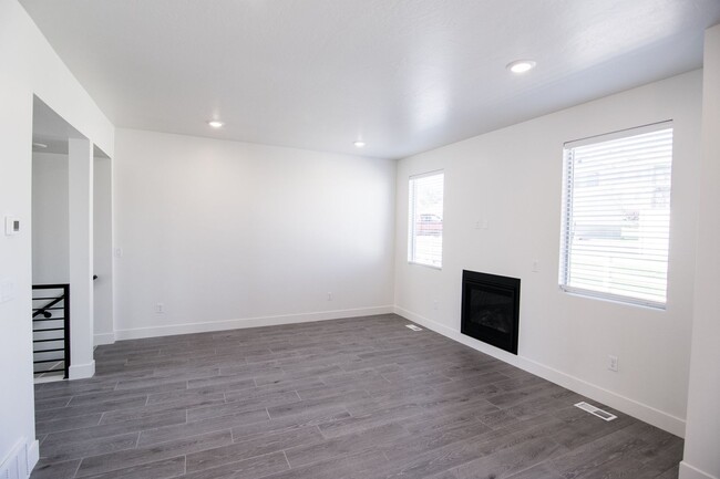 Building Photo - Gorgeous 2-Story Townhome with Finished Ba...