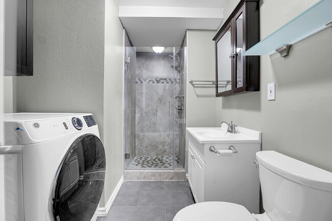Building Photo - $2,720.95 - 4 bed, 2 bath, located in Aurora with attached Garage and In Unit Washer and Dryer!
