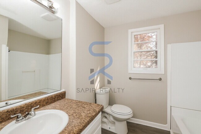 Building Photo - Move in before December 31st and choose your reward: a $250 Amazon Gift Card or a 55" Smart TV!