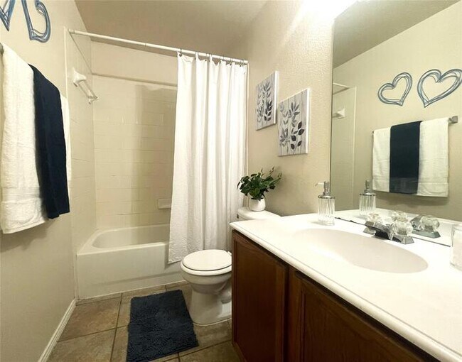 Building Photo - Plank Floors & Modern Comforts!" "Corner Fireplace, Split Bedrooms & a Master Retreat You’ll Love!"