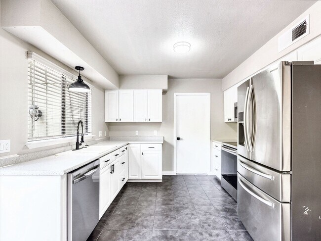 Building Photo - Contemporary 3/BR 1.5/BA Home with Updated...