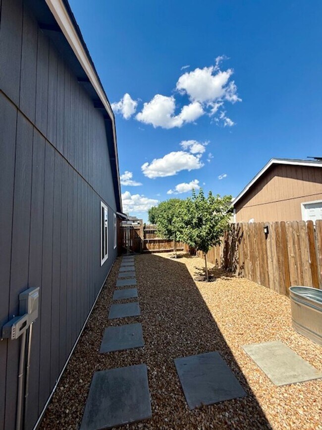 Building Photo - Serene Remodeled 4 Bedroom on Large Lot w/...