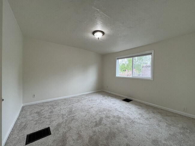 Building Photo - Character-Filled Concordia Home with Flexible Living Spaces & Gas Fireplace