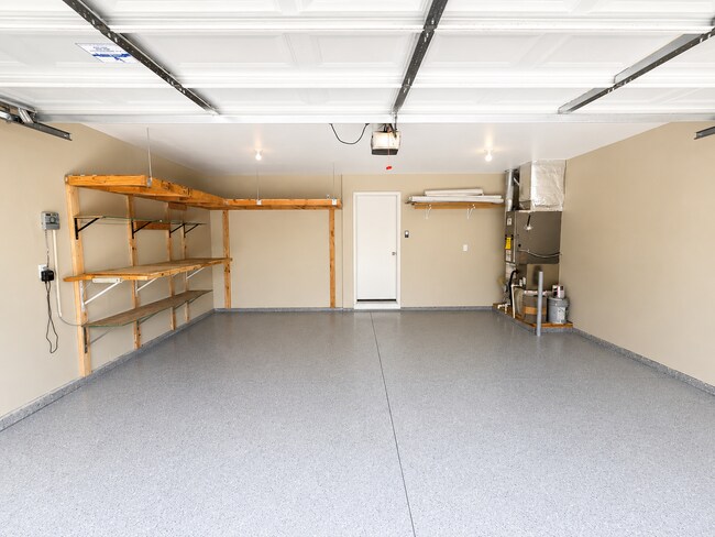 Building Photo - Easy-Living 3 Bed, 2 Bath Home with Double Garage, Pool Access & Private Courtyard