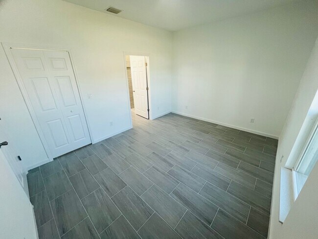 Building Photo - BRAND NEW 3/2/1 SINGLE FAMILY HOME--SW LEHIGH ACRES