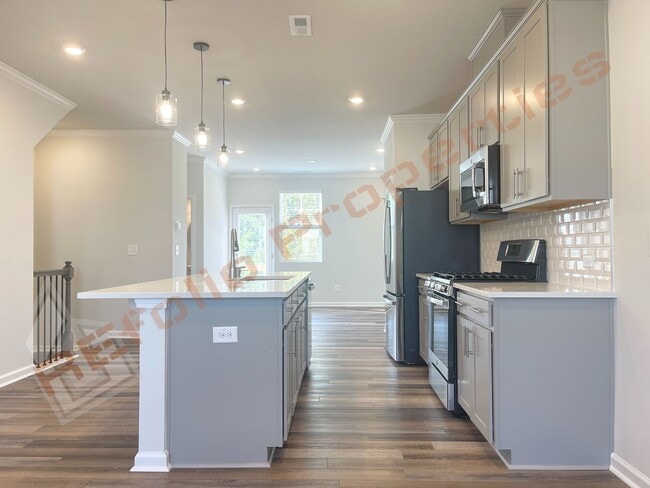 Building Photo - Gorgeous 3 Bedroom 3.5 Bath Townhome with ...