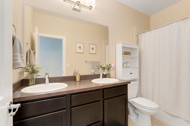 Building Photo - Evolve Real Estate: Evolve Real Estate: Meticulous Executive 4 Bedroom Plus Den Plus Finished Bas...