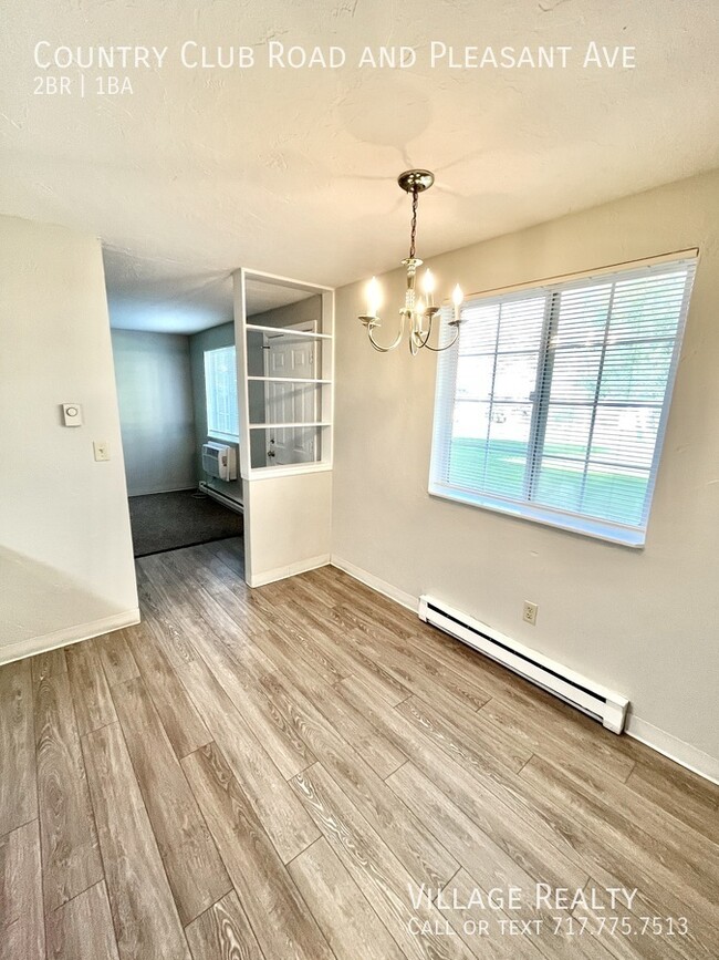 Building Photo - Roomy, remodeled 2-bed w/ on-site laundry ...