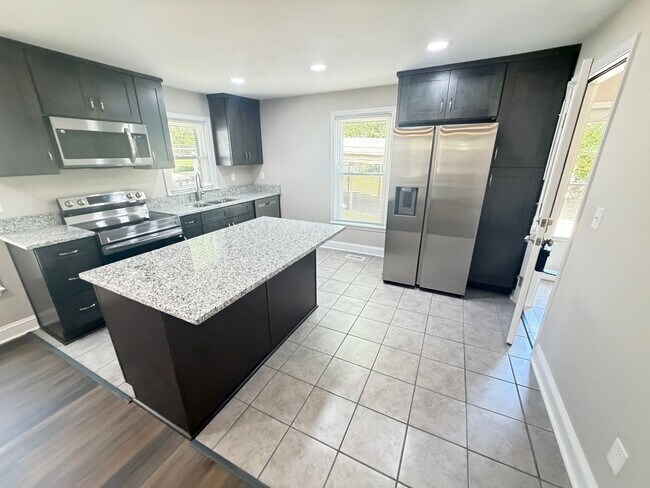 Building Photo - Fully Renovated 2-Bed Charmer on a Spacious Corner Lot – Near Downtown!