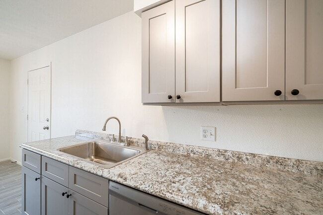 Building Photo - Updated home with large backyard & 2 car g...