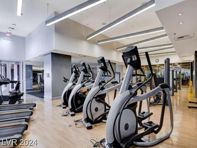 Building Photo - Iconic Strip-View Luxury | Elegant 1BR + Den High-Rise Residence