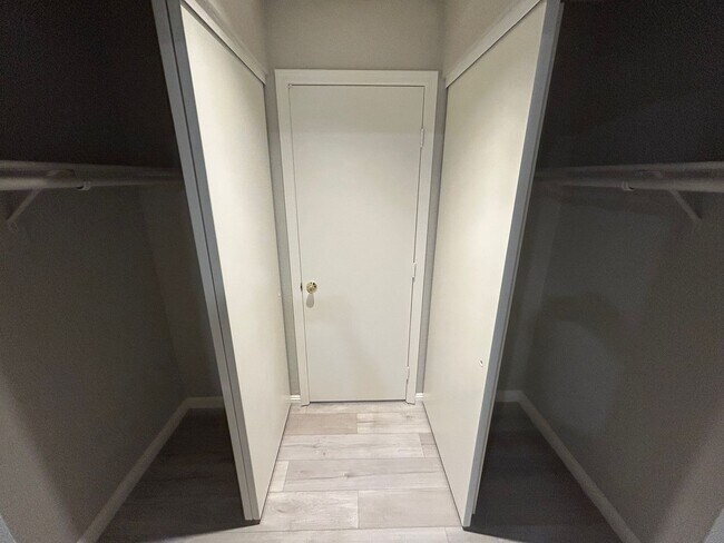 Building Photo - INVITING 2 BEDROOM TOP FLOOR CONDO IN A CE...