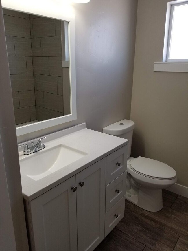Building Photo - Spacious 5-Bedroom Magna Home with Deck and Ample Parking