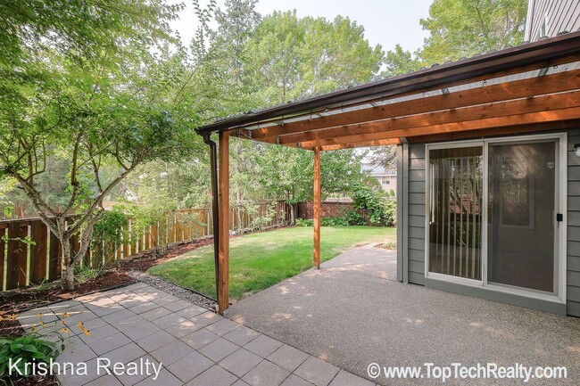 Building Photo - 4 br, 2.5 bath House - 5910 NW Snowlily Dr