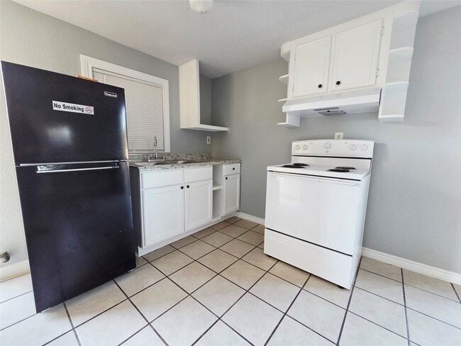 Building Photo - 5403 Ave Q 1/2