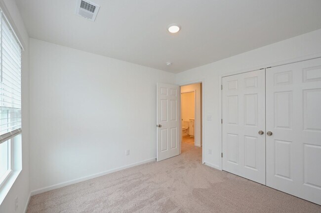Building Photo - **BE THE LUCKY ONE TO LIVE IN THIS 2024-BUILT BRICK TOWNHOME IN THE VILLAS AT REGAL SQUARE FEATUR...