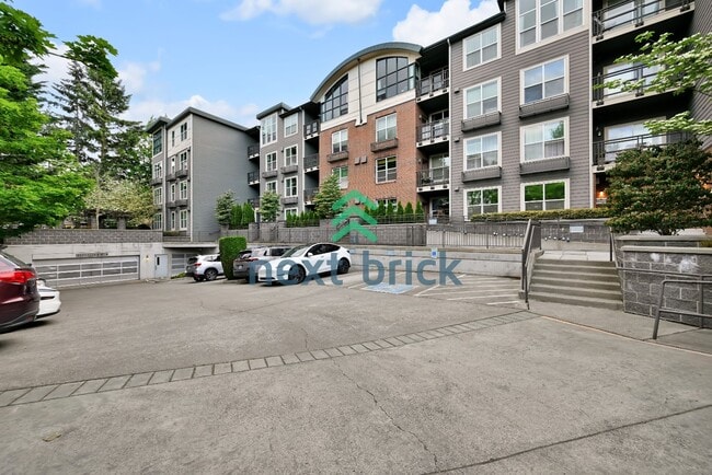 Building Photo - "Charming 1-Bedroom Condo in Redmond: Cozy Living with Modern Comfort at 641 Sq Ft!"