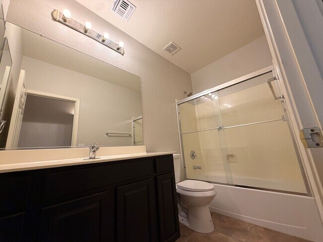 Building Photo - *NEW* Custom Paint/*NO* Carpet 3 BD/2 Bath Spacious Surprise Home!