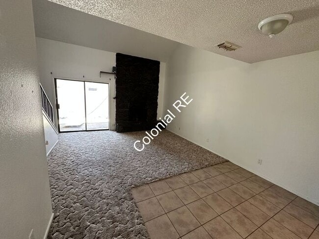 Building Photo - Spacious 3 bedroom 2 bathroom townhouse for rent. Fireplace in living area, washer/dryer hookups,...