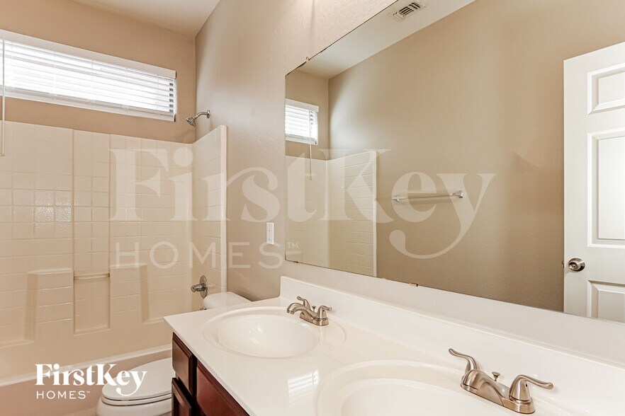 Building Photo - 14135 W Riviera Dr