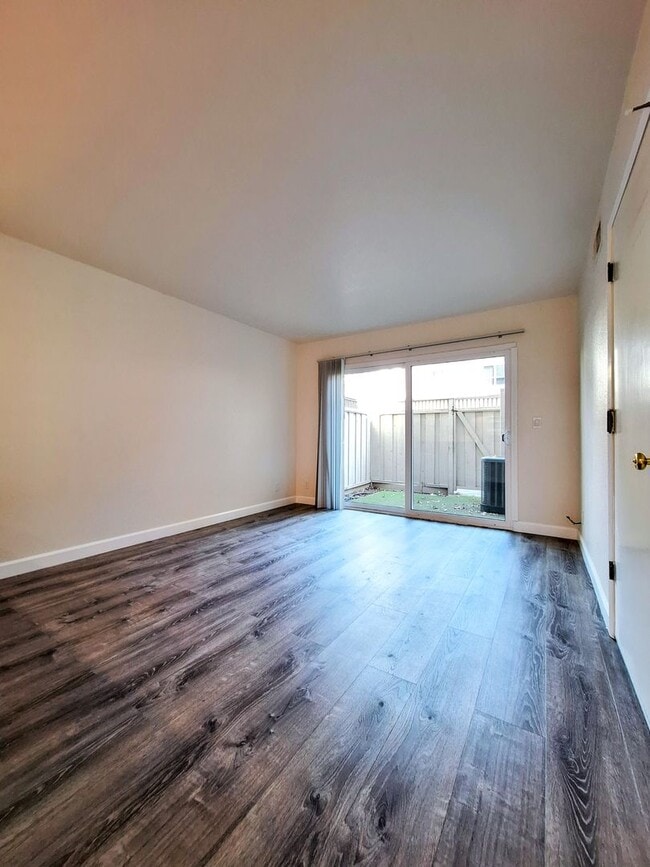 Building Photo - Spacious Two-Story 3bd Townhouse With Private Patios, Balcony, & Garage