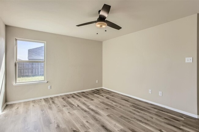 Building Photo - This well-maintained 4 bedroom home is located in a quiet neighborhood that has a community park ...