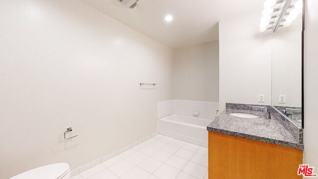 Building Photo - 1545 S Bentley Ave