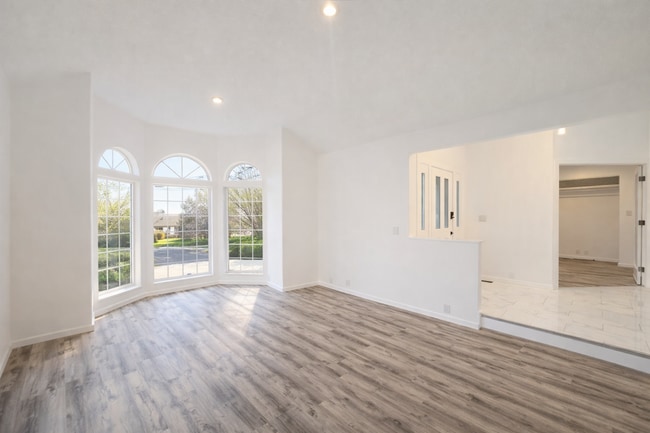 Building Photo - Executive 3 Bed Home with 3 Car Garage & Private Fenced Yard