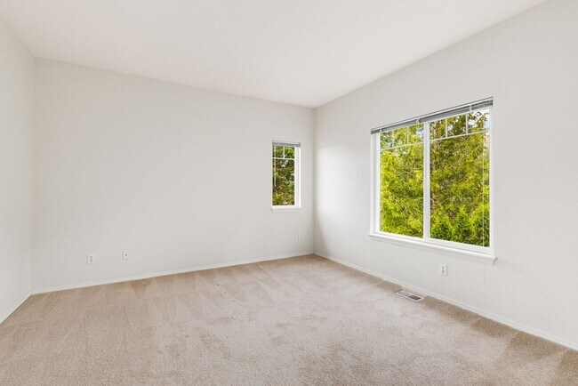 Building Photo - End Unit 2 Story Townhome Plus Bonus Office Area - 2 Car Garage