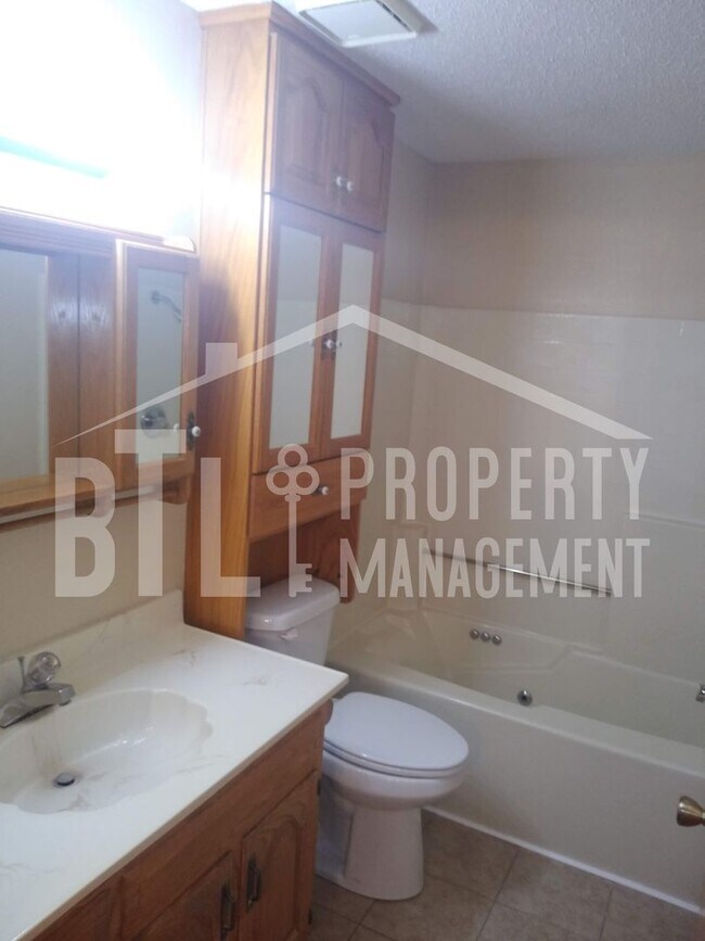 Building Photo - Condo by Lake with RV Spot!! 55+ Community