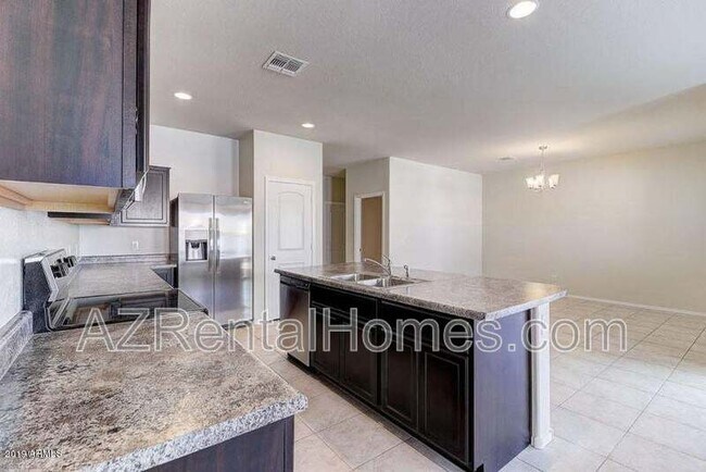 Building Photo - 37748 W Bello Ln