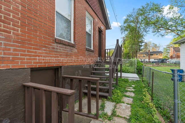 Building Photo - 7135 Woodrow Ave